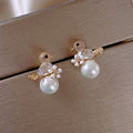 Pendientes de lujo Birdie en zirconia cúbica y revestimiento de perla