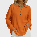 Laura | Jersey naranja con cuello polo