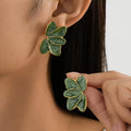 Par de pendientes de flor de resina