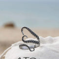 Anillo ajustable plateado con tentáculos