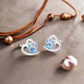 Pendientes con pata y corazón con circonita