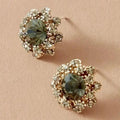 Pendientes redondos verdes brillantes