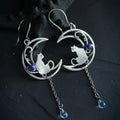 Pendientes Boho de circonita azul con gato en plata