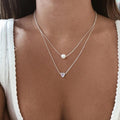Collar con corazón de plata y perlas