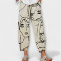 Annegret | Pantalón con estampado de rostros