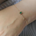 Pulsera de oro con cristal verde
