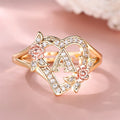 Anillo A de oro y cristales