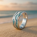 Anillo Aurora de las olas del océano y la playa