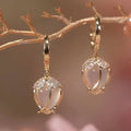 Pendientes vintage blancos Tulipa con circonita