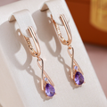 Pendientes colgantes con circonita violeta en oro