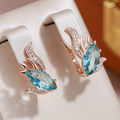 Elegantes pendientes con cristales turquesa en oro