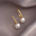 Pendientes Elegantes de Perlas Doradas Brillantes
