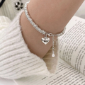 Elegante pulsera con corazón en plata