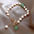 Pulsera vintage con perlas y piedras preciosas verdes doradas