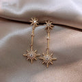 Pendientes vintage de oro con estrella de cristal