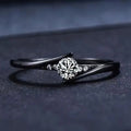 Anillo vintage en oro negro con cristal
